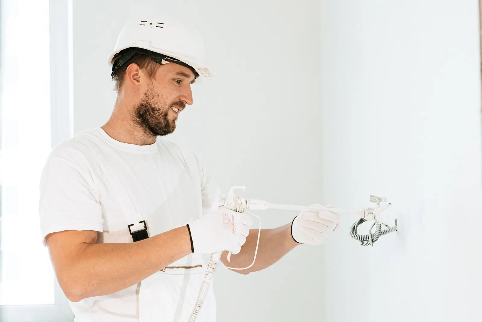 Commercial electrician wiring a new build-out